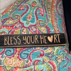 Colorful Paisley Quilt with Decorative Sign